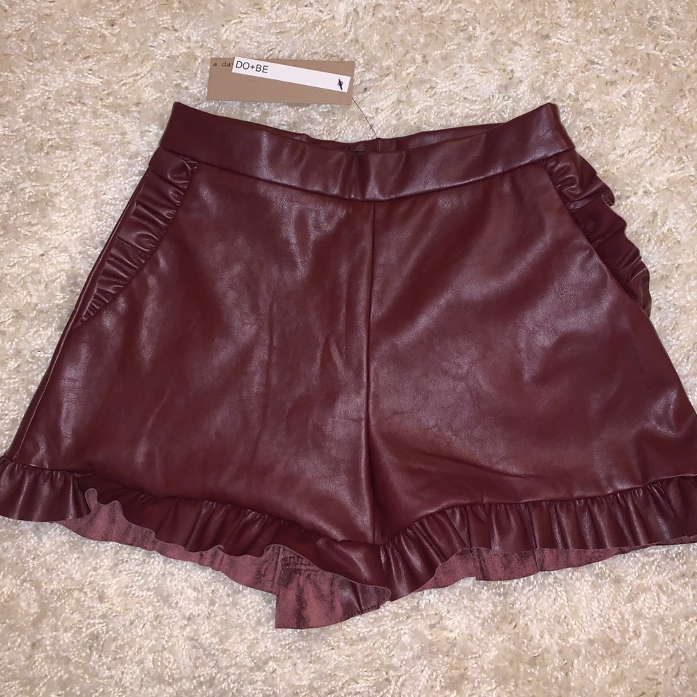 red leather ruffled shorts